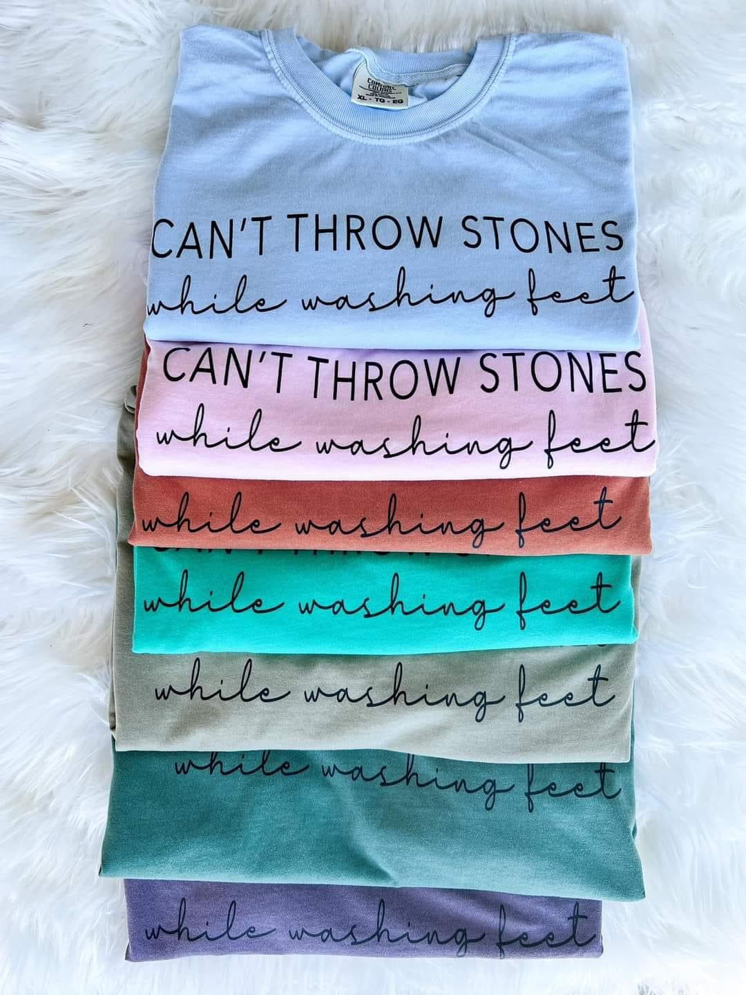 Can’t throw stones while washing feet graphic tee