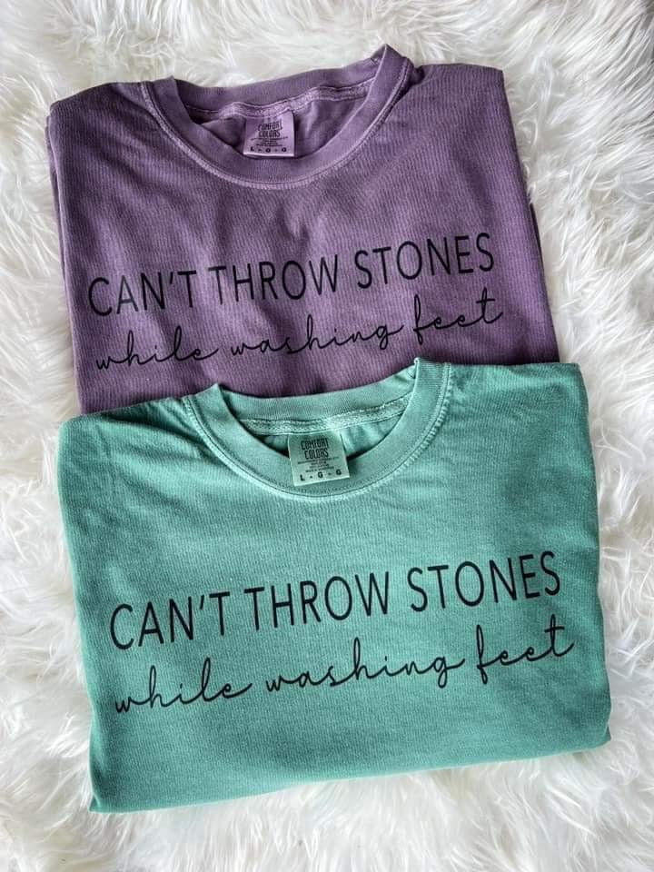 Can’t throw stones while washing feet graphic tee